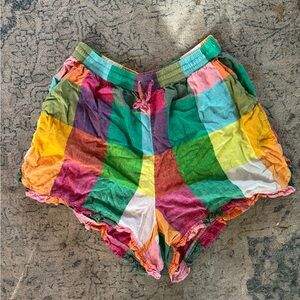 Elastic waist with tie shorts. Colorful with pockets! Super comfy